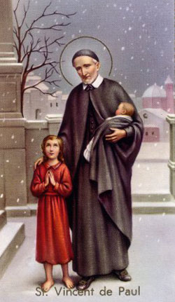 A painting of St. Vincent DePaul holding a child.